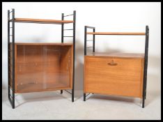 A good mid century Danish inspired teak wood and ebonised metal upright modular wall system in the