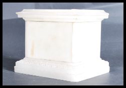 A 19th Century chiselled marble plinth stand / base with decoration to bottom.  Measures 19.5 cm