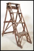 An early 20th century wooden trellis - lattice worked Industrial step ladder. Ideal as conversion to