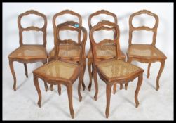 A set of 6 19th century French walnut bergere cane