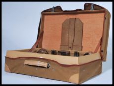 A gents vanity travelling suitcase / case fully appointed having various white metal topped glass