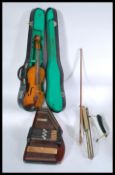 Musical Instruments: A vintage early 20th century Harpsichord together with a cased vintage violin
