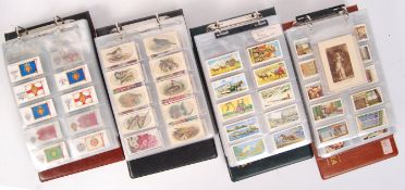 Cigarette cards; a large collection (x4 albums) of assorted full sets of cigarette cards - various