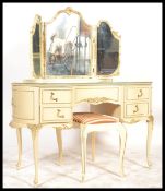 A 19th century style Louis style mirror back dressing table having a triptych mirror raised above