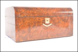 A 19th century walnut dome top ladies workbox date