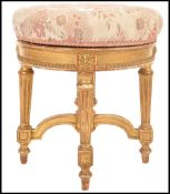 A 19th century French giltwood and gesso revolving