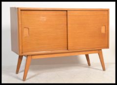 A 1950's mid century sideboard - credenze being ra