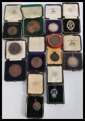 A group of bronze medallion medal coins dating from the 19th century to include Western Daily