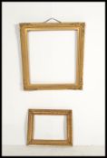 A 19th century Victorian highly ornate gilt wooden and plaster painting picture frame together