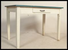 A mid 20th Century vintage dining / kitchen / scullery table, blue Formica top raised on painted