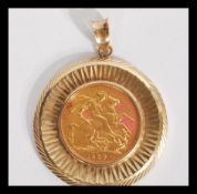 An early 20th century full sovereign pendant having an Edwardian 1907 sovereign coin in a 9ct gold