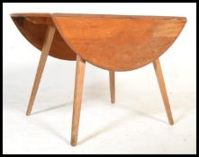 A retro mid 20th century beech and elm Ercol drop