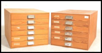 A pair of retro 20th Century six drawer Industrial / school  pine filing cabinets, each drawer