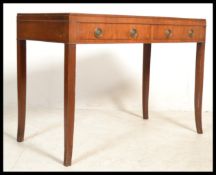 An Edwardian mahogany bow front writing table desk