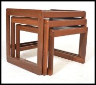 A set of three retro 20th Century tile topped teak