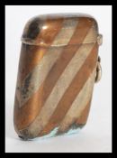 A silver ( tested ) early 20th century vesta case with chevron patterns complete with bale to