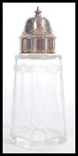 A silver hallmarked and cut glass Art Nouveau sugar sifter  / caster. Hallmarked for Hukin & Heath