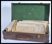 A suitcase of ephemera and effects dating from the mid 19th century to include multiple diaries ,
