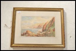 A 19th century watercolour painting of a Devon sea