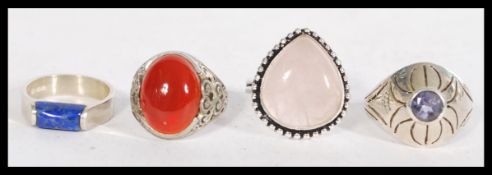 A collection of 4 925 silver rings including carnelian, lapis lazuli, rose quartz. Marked 925.