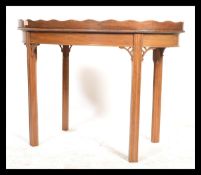 A 19th century mahogany butlers tray with gallery