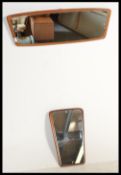 A pair of non matching  retro 1970's atomic / style sputnik type teak wood frameless mirrors, each