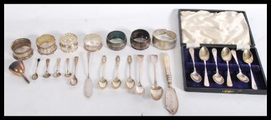 A group of silver hallmarked flatware dating from the early 19th century to include a cased set of