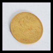 An Edward VII 1902 gold half sovereign Weighs 3.98 grams. Measures 2 cm diameter.