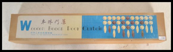 A retro 20th Century vintage unused beaded doorway