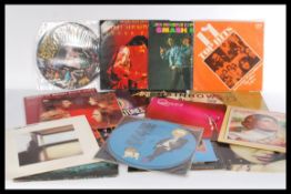 A collection of vinyl long play records featuring several artists to include Jimi Hendrix, Napalm