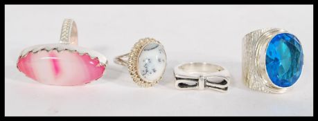 A collection of 925 silver rings set with various