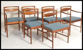A set of 6 vintage mid century teak framed dining
