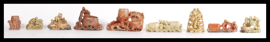 A group of Chinese hand carved soapstone all featu