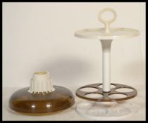 A vintage / retro 20th Century formed plastic circ