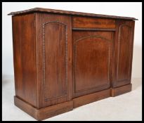 A 19th century Georgian mahogany side cabinet havi