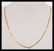 A hallmarked 9ct gold figaro link necklace chain. Measures 40cms and weighs 6.3 grams.