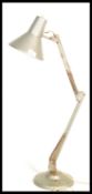 A mid century retro Industrial anglepoise lamp in