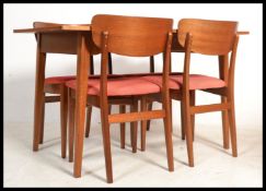 A vintage mid 20th Century dining table of rectang