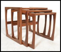 A 1970's G-Plan Kelso teak and tile top nest of ta