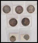 A group of silver English coins dating from the 17