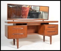 A vintage retro 1970's retro teak wood G-Plan Kelso dressing table having pedestals of drawers