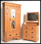 An Edwardian satin walnut bedroom suite consisting of a single wardrobe with plinth drawers and