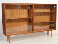 A good mid century teak wood library bookcase cabi
