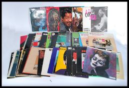 A very large collection of long play LP vinyl record albums featuring many different artists and