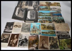 A collection of postcards to include Polzeath, Roy