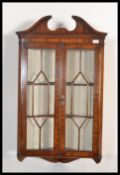 A good Georgian revival mahogany hanging bookcase