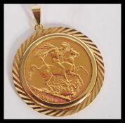 A 19th century Victorian full sovereign pendant having an inset 1887 young bust coin in a 9ct gold