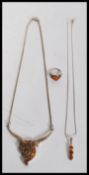 A collection of 925 silver amber set jewellery to include a large festoon pendant necklace