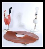 A collection of items to include milk glass table