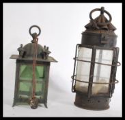 Two vintage early 20th Century porch lanterns, one of Arts and Crafts form with leaded panel glass